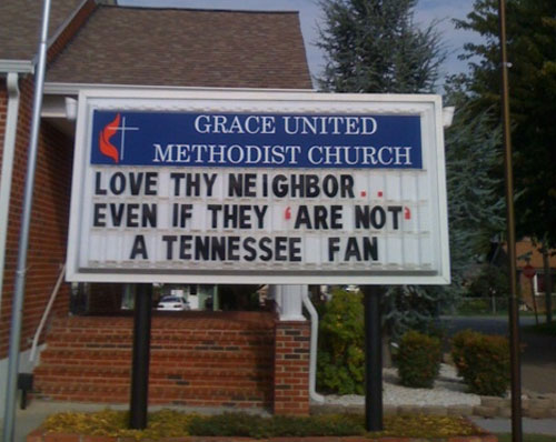 Funny church sign - love thy neighbor, even if they are not a Tennessee fan.